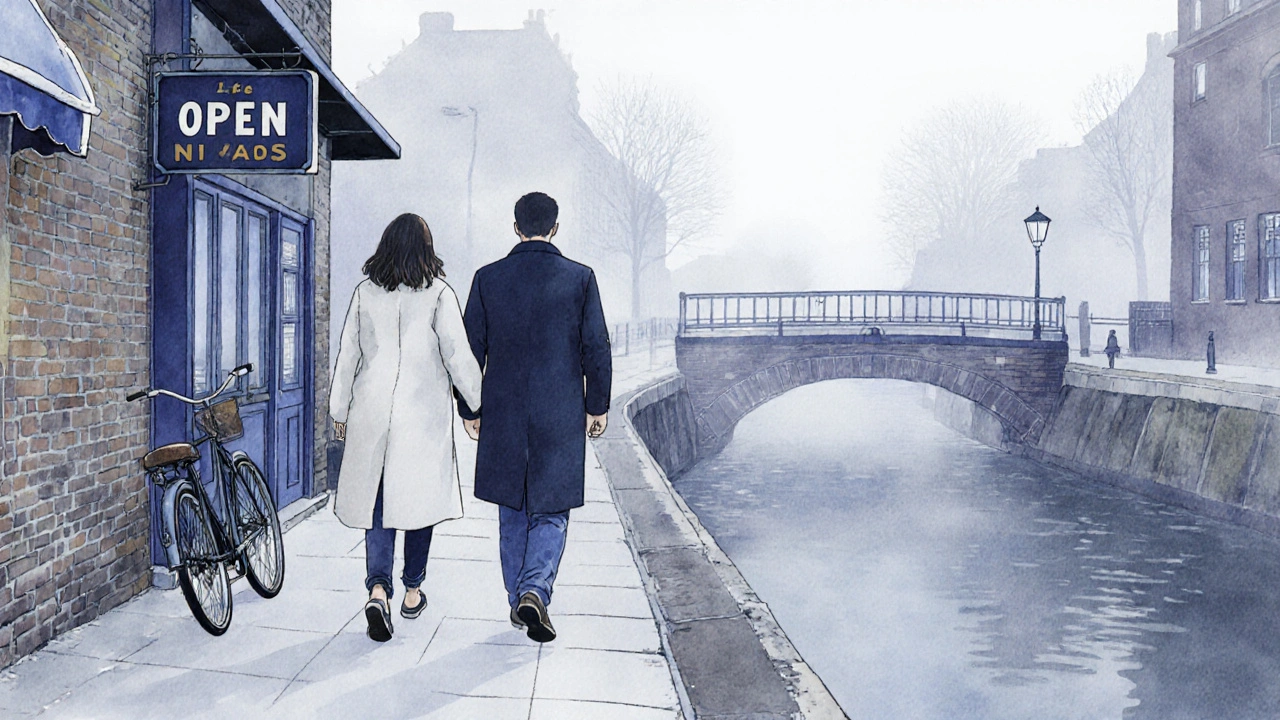 Two people walking peacefully along the Regent’s Canal in East London at sunrise.