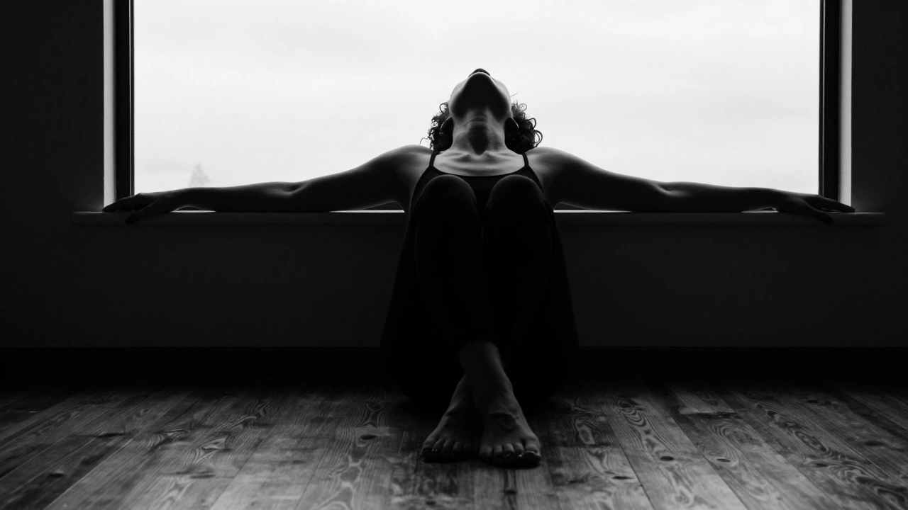 Silhouette against window, arms open, leaning back into sill, light tracing ribs and collarbone in soft shadow.