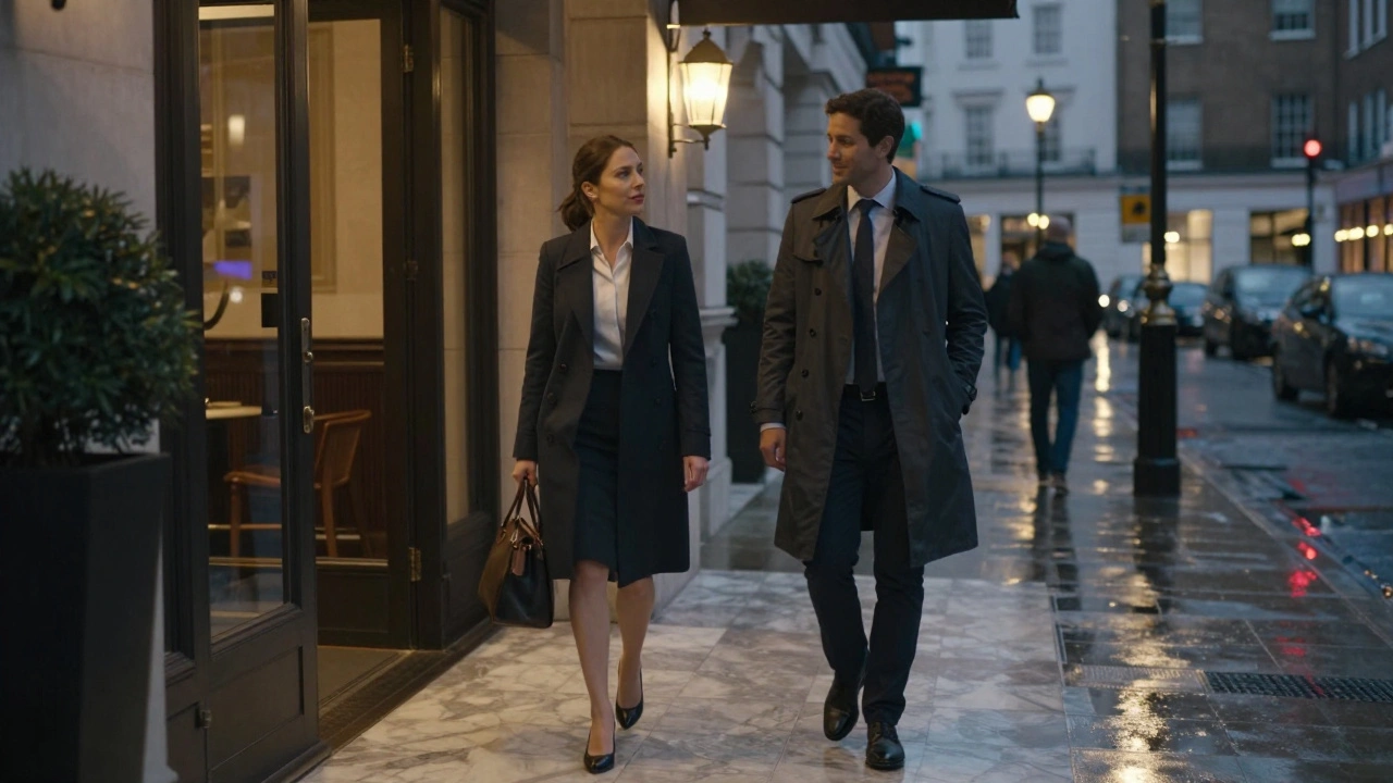 A professional escort and client meeting calmly in a luxury hotel lobby at dusk.