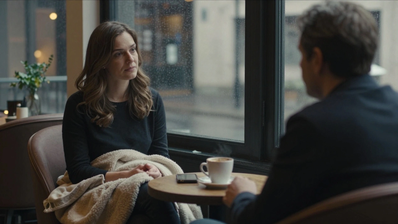A woman listens attentively to a man in a softly lit hotel lounge, capturing emotional vulnerability and quiet connection.