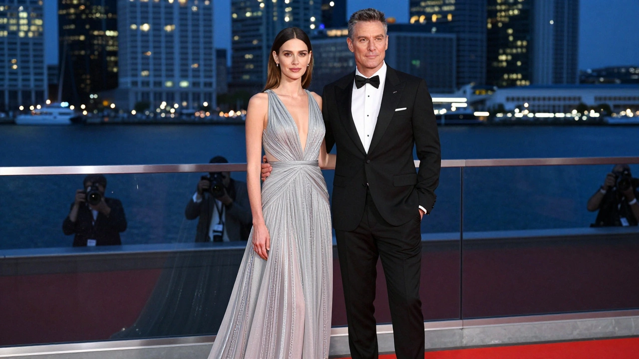 Dressed couple posing confidently at a formal business gala event.